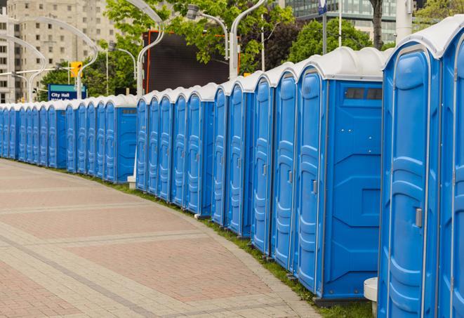a row of portable restrooms at a fairground, offering visitors a clean and hassle-free experience in lakeland